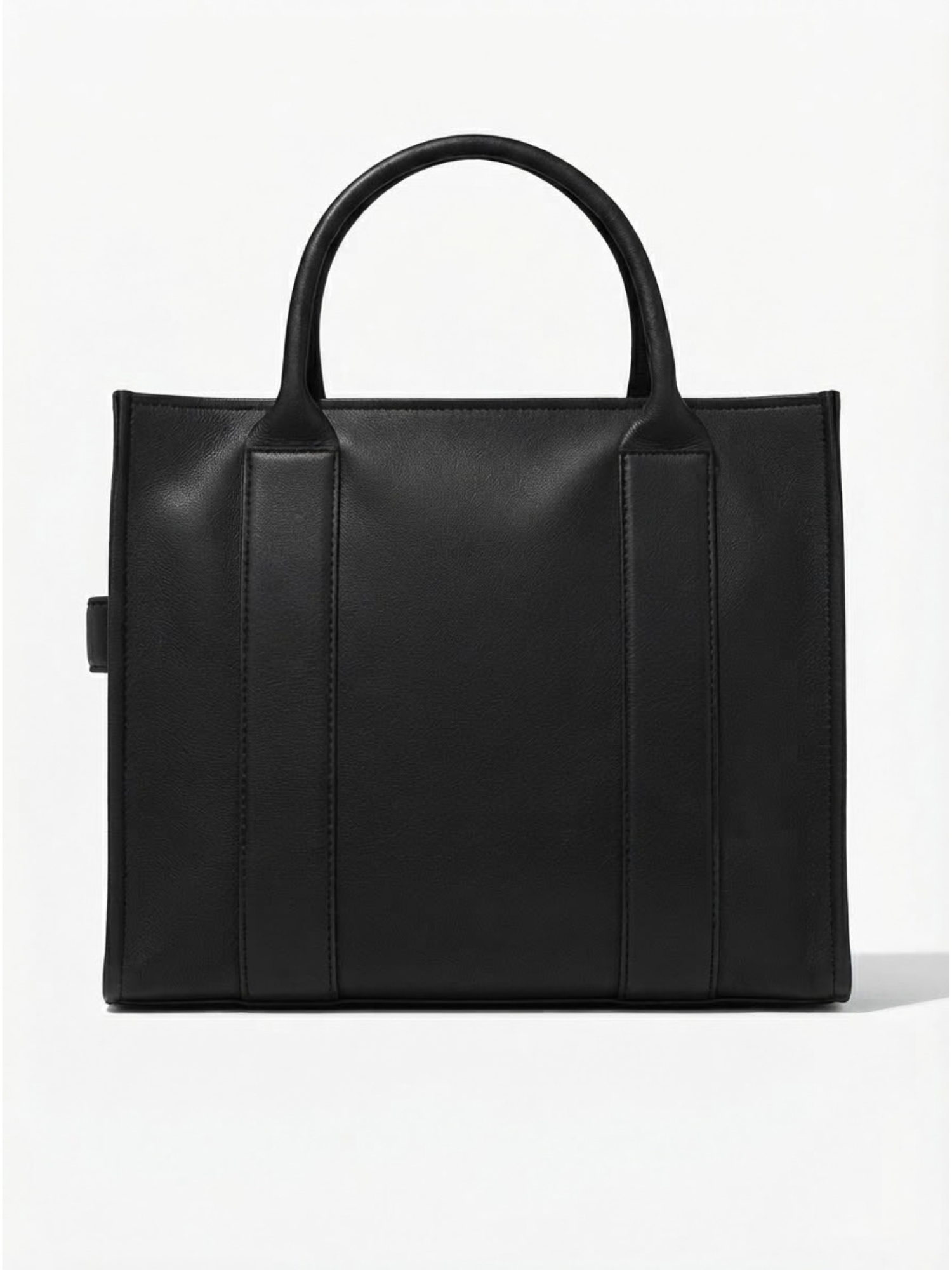Back view of the solid black leather tote handbag showcasing clean structural stitching and dual top handles against a white background.