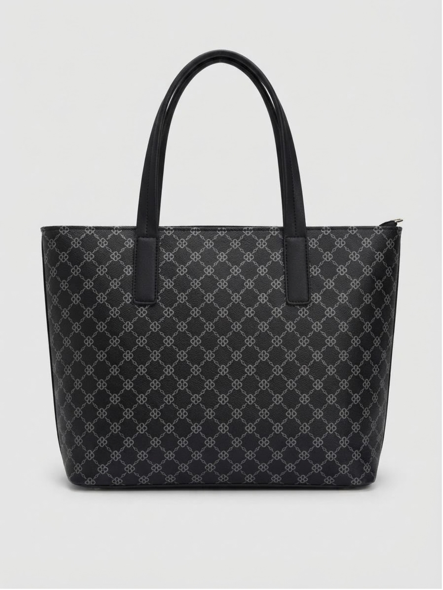Back view of the black monogram tote bag showcasing the clean textured leatherette finish and sturdy top handles.