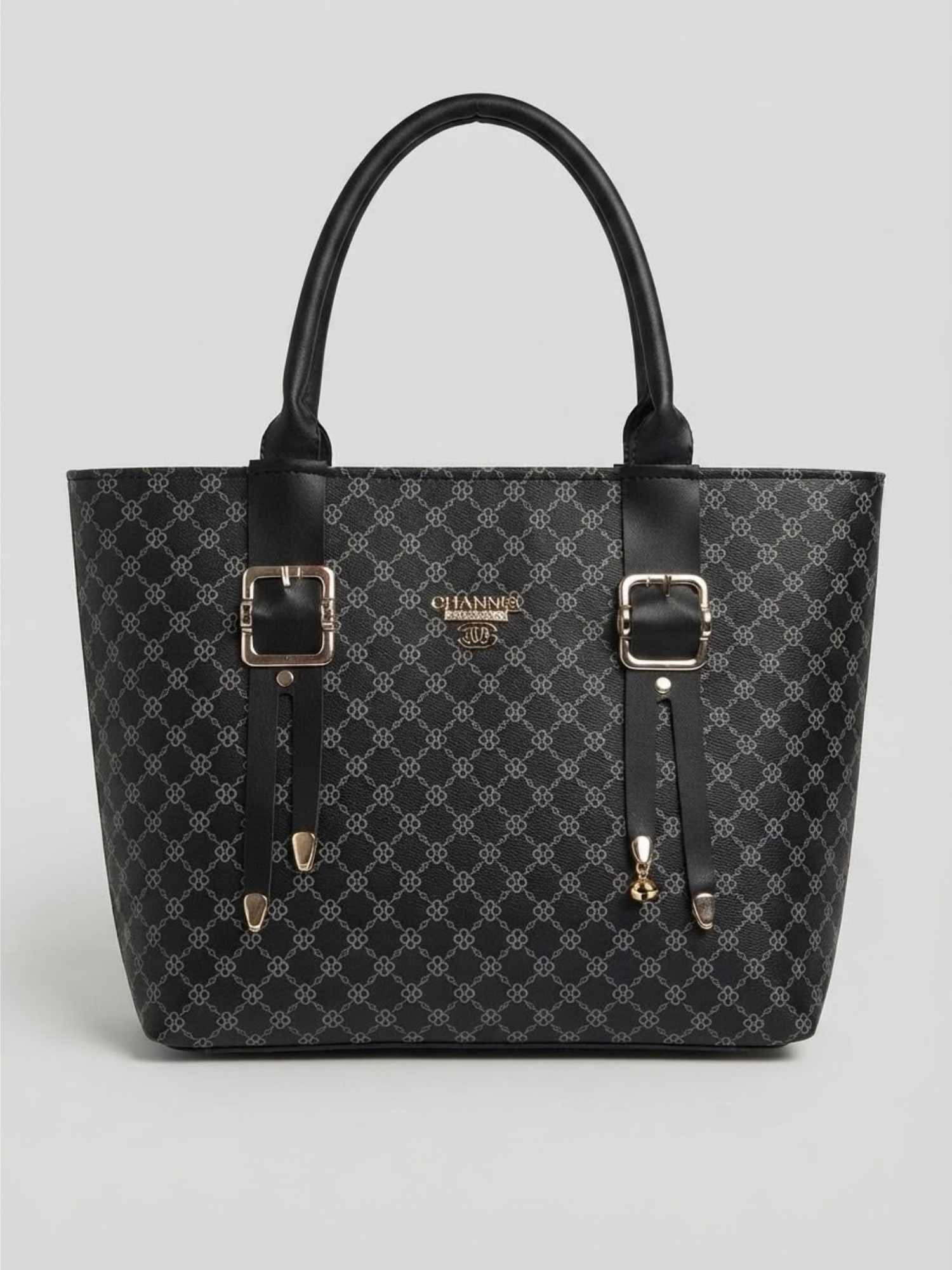 Front view of a black monogram patterned tote handbag featuring dual buckle straps and gold hardware against a light gray background.